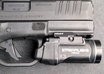 Springfield Hellcat Pro with proper fitting Streamlight TLR-7 Sub